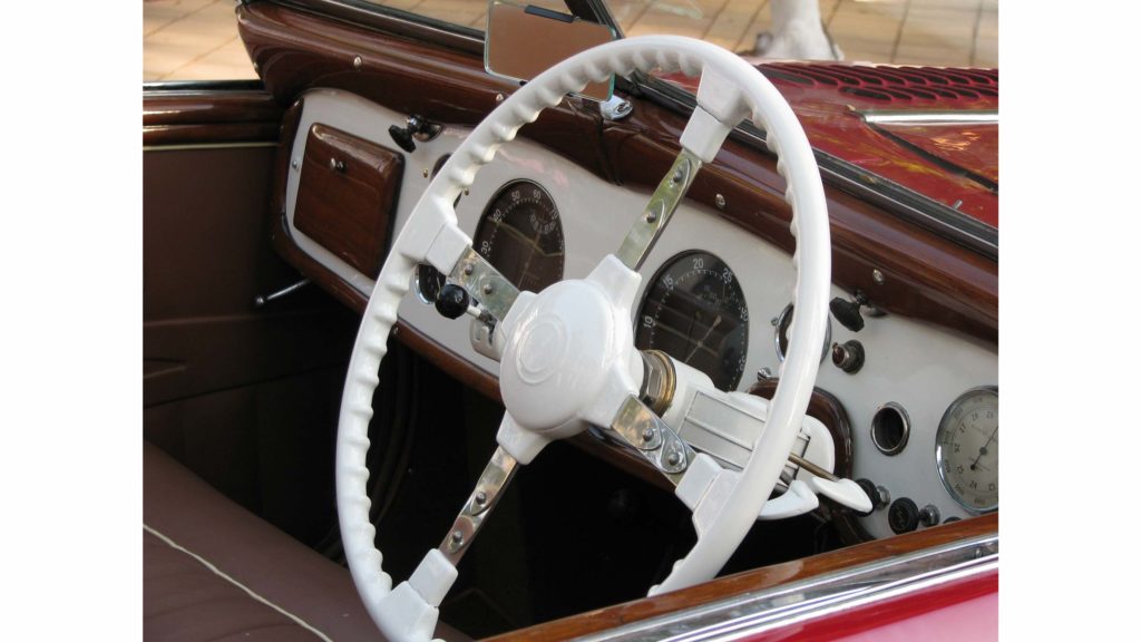 View of the dashboard and steering wheel of Delahaye 135MS 1939, Photo Credit: Karl Bhote