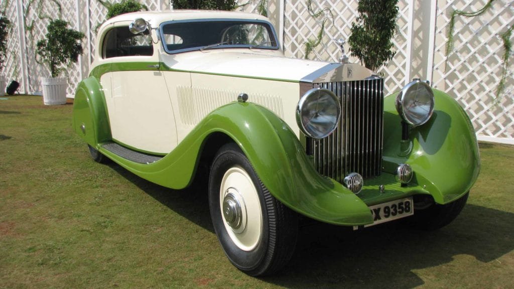 View of Rolls-Royce Phantom II that highlights the streamline design and significant deco details, Photo Credit: Karl Bhote