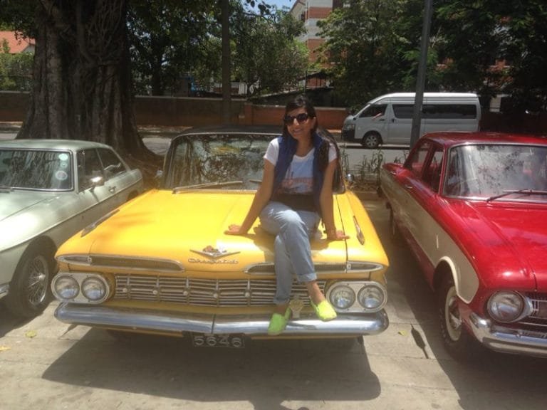 Dhara amongst a bevy of period vintage cars in  Sri Lanka. The film used a mind boggling 200 vintage cars in the film. Photo courtesy: Dhara Jain