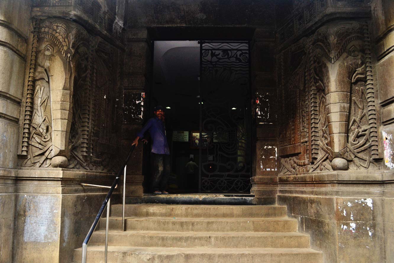 Carved elephants and patterned gate at the entrance of the Lakshmi Building. Source: Maya Sorabjee