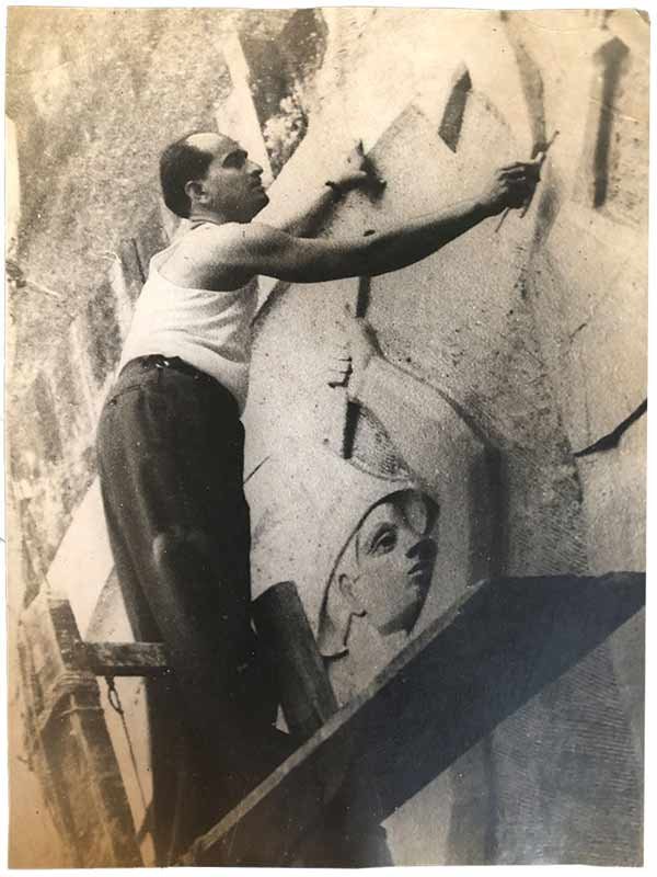 Pansare (wearing dark coloured trousers) working on the reliefs on the Ashoka Hotel in Delhi in the 1950s. The mural he is pictured carving here was 22 feet tall; Source: Pansare Family Archive