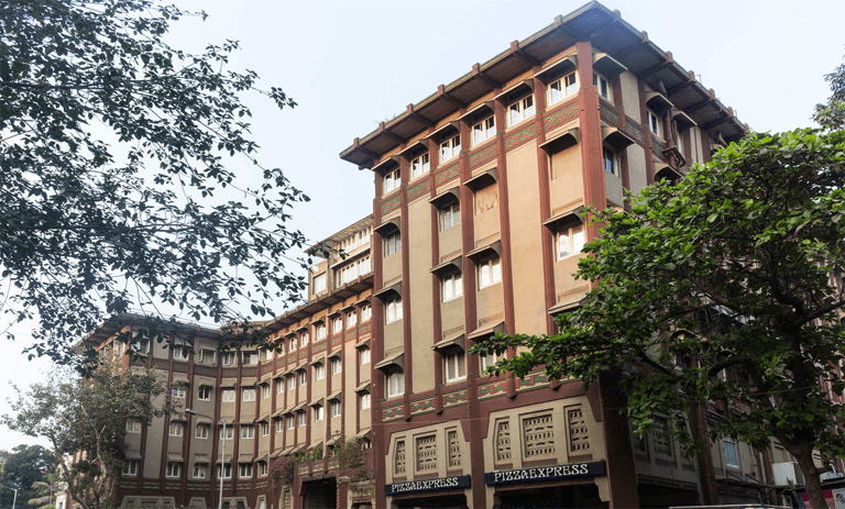 The facade of Dhanraj Mahal as it stands today, captured by Art Deco Mumbai in 2017. Source: Art Deco Mumbai Trust